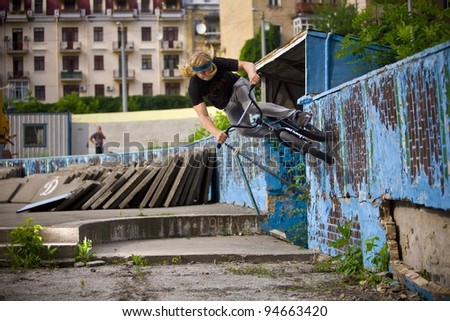 BMX rider performing air trick 
