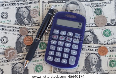Change, Calculator, pen and money