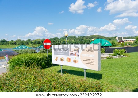 POZNAN, POLAND - MAY 31, 2014: Promotional sign of an restaurant at the Malta park