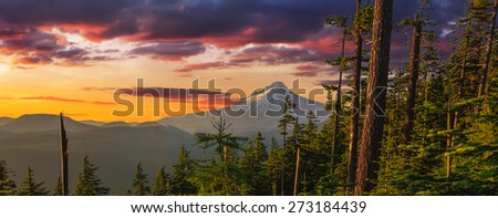 Majestic View of Mt. Hood on a bright, colorful sunset during the summer months.