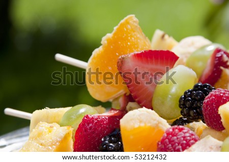 Fruit Kebab made of Oranges, Strawberries, Grapes, Blackberries, Raspberries.