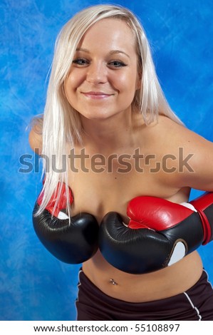 stock photo Young sexy girls in boxing gloves on the blue mosaic 