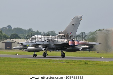 FAIRFORD, UK - JULY 8: Royal Air Force Tornado aircraft participates in the Royal International Air Tattoo airshow event July 8, 2012 near Cirencester, England.