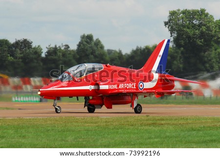 FAIRFORD, UK - JULY 18: Royal Air Force Hawk of the Red Arrows acrobatic team participates in the Royal International Air Tattoo airshow event July 18, 2009 near Cirencester, England.