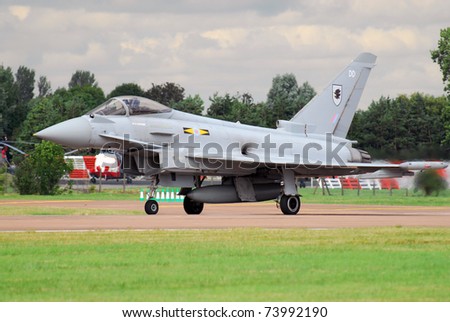 FAIRFORD, UK - JULY 18: Royal Air Force typhoon aircraft participates in the Royal International Air Tattoo airshow event July 18, 2009 near Cirencester, England.