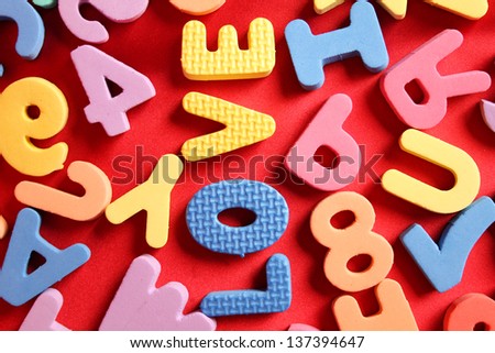 Close-up of a lot of letters of the English alphabet. Word love