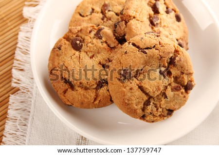 Close-up of round chocolate biscuits are on the plate