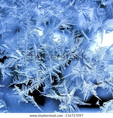 Ice crystals on window in winter