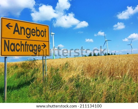 German words ANGEBOT / NACHFRAGE  (supply / demand) on a roadsign