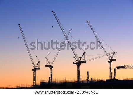 Many cranes at Australian construction site (Sunshine Coast, Kawana Waters, QLD, Australia)-all logos removed