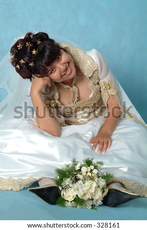 Bride with wedding veil and flowers