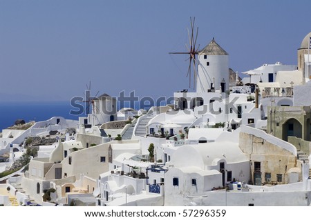 Santorini view with two windmills