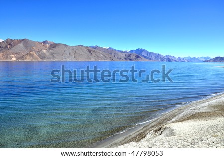 waves in long deep blue lake with clear water