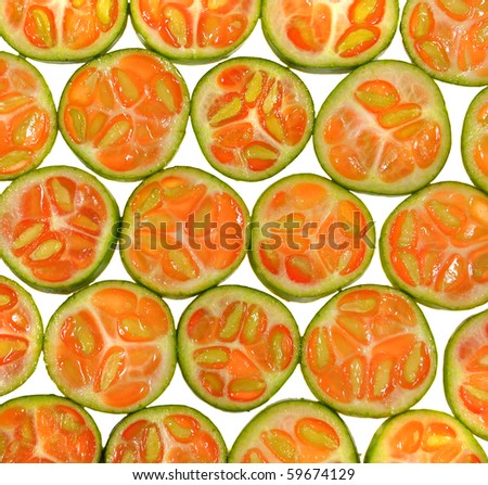 top view of sliced piece of little gourd arranged on white background