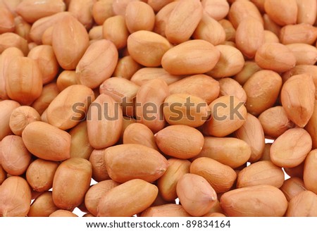 close up top view of pile of seeds of groundnuts (peanut)