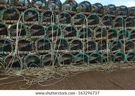 Lobster or crayfish pots stacked on fishing boat