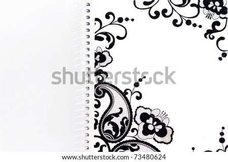 Fine texture of a bound notebook on white background.