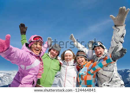 Portrait of Group of  teenagers have a good time in winter