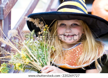 girl in fairy costume on holiday halloween