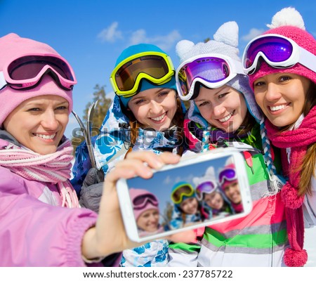winter group of young woman  salfy in ski resort