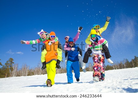 group of friends have a good time in winter resort