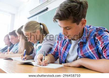 group of students takes the test in class