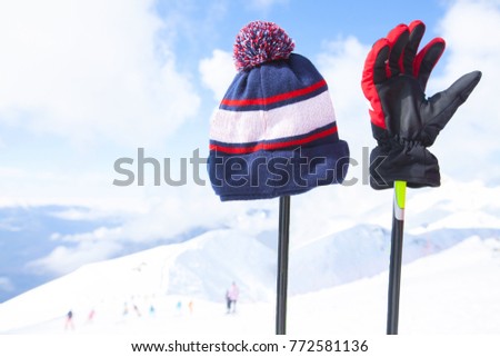mountain skiing set standing in the snow against the backdrop of the beautiful snow-capped mountains