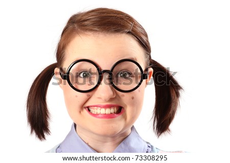 stock photo Teenage girl dressed and madeup like a geek