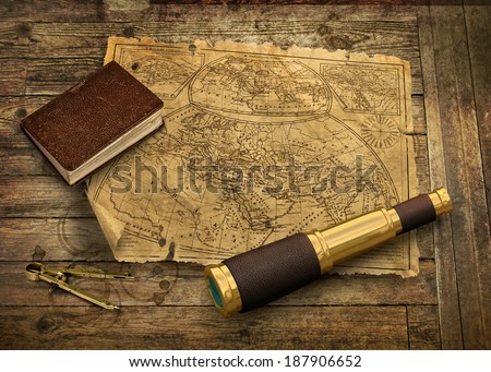 Old nautical map with telescope and logbook, navigation concept