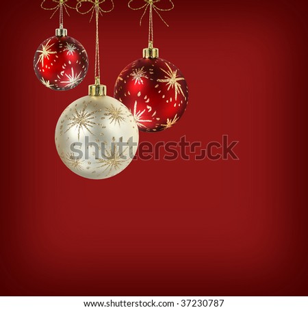 Decorated red and white christmas balls on vivid crimson red background