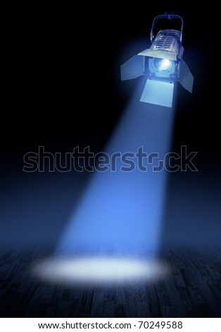 Professional stage spotlight lamp beam  glowing on dark background