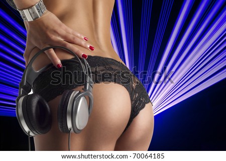 stock photo sexy ass with dj headphones over lasers