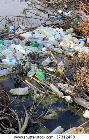Old plastic bottles in the river, river contamination