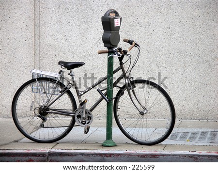 Bicycle locked to Parking Meter