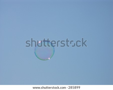 Bubble floating against blue sky