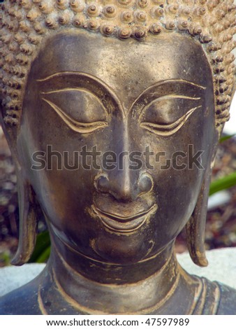 Bronze Buddha Face