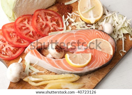 Stake from a salmon with vegetables