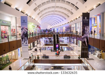 DUBAI, UAE - NOVEMBER 14: Shoppers at Dubai Mall on Nov 14, 2012 in Dubai. At over 12 million sq ft, it is the world\'s largest shopping mall based on total area and 6th largest by gross leasable area.