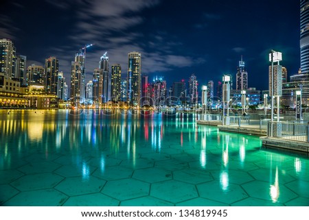 DUBAI, UAE - NOVEMBER 13: Modern skyscrapers in Dubai (emirate and city). Dubai now boasts more completed skyscrapers higher than 0,8 - 0,25 km than any other city, taken on 13 November 2012 in Dubai.