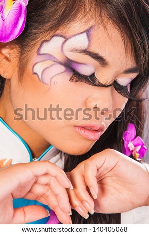 Beautiful fantasy eye face-art close-up portrait of a beautiful asian woman