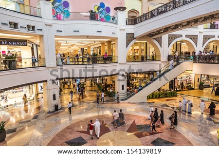 Dubai, Uae - April 29: Shoppers At Mall Of The Emirates On April 29, 2013 In Dubai. Mall Of The Emirates Is A Shopping Mall In The Al Barsha District Of Dubai.