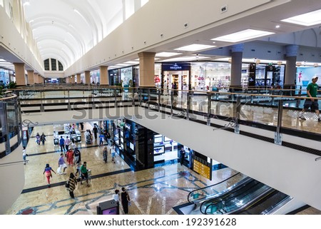 DUBAI, UAE - APRIL 29: Shoppers at Mall of the Emirates on April 29, 2013 in Dubai. Mall of the Emirates is a shopping mall in the Al Barsha district of Dubai.