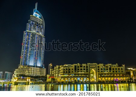 DUBAI, UAE - NOVEMBER 13: Address Hotel and Lake Burj Dubai in Dubai. The hotel is 63 stories high and feature 196 lavish rooms and 626 serviced residences, taken on 13 November 2013 in Dubai.