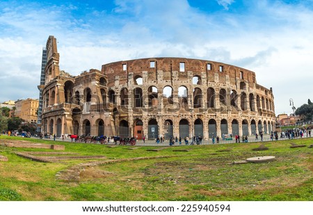 ROME - DECEMBER 21: Coliseum exterior on December 21, 2013 in Rome, Italy. The Coliseum is one of Rome\'s most popular tourist attractions with over 5 million visitors per year.