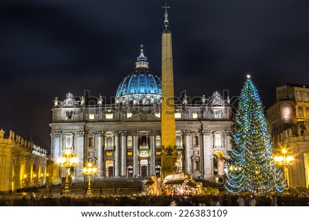 Night view on the St. Peter\'s Square and the St. Peter\'s Basilica and the obelisk from the Circus of Nero in Vatican City. Rome, Italy.