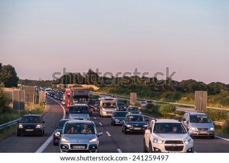 COPENHAGEN, DENMARK - JULY 25: Traffic jam at the highway connecting Denmark and Sweden in Denmark July 25, 2014