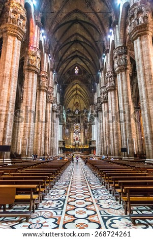MILAN, ITALY - JULY 12, 2015: Inside  famous Milan Cathedral, Duomo in a beautiful summer day on July 12, 2014 in Milan, Italy.