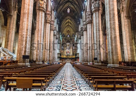 MILAN, ITALY - JULY 12, 2015: Inside  famous Milan Cathedral, Duomo in a beautiful summer day on July 12, 2014 in Milan, Italy.