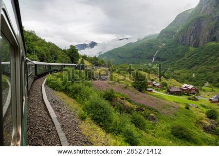 Train at famous Flam railway (Flamsbana) line in Flam valley in Norway
