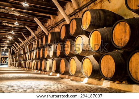 Barrels in the wine cellar in Porto in Portugal